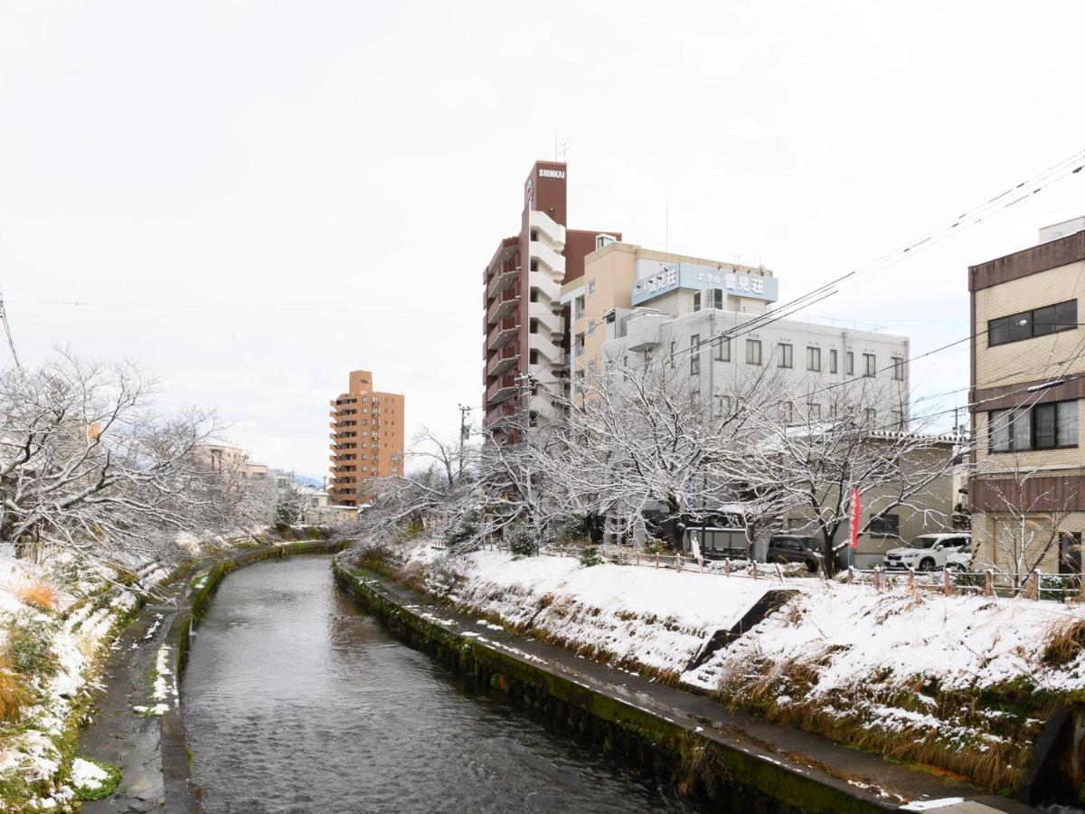 Tabist Business Ryokan Hotel Yukimiso Toyama Station Extérieur photo
